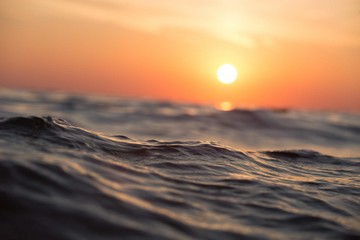 Sun set over sea - Do Wetsuits Protect From Sun Ultra Violet Rays small