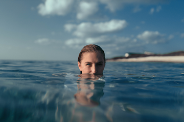 Swimmer on surface - Can You Open Your Eyes In The Ocean small