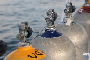 Why are scuba tanks filled in water