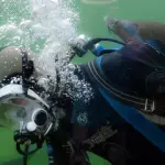 How Do You Vent Air From Your Drysuit While Underwater small