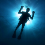 What should you and your buddy do if separated during a dive?